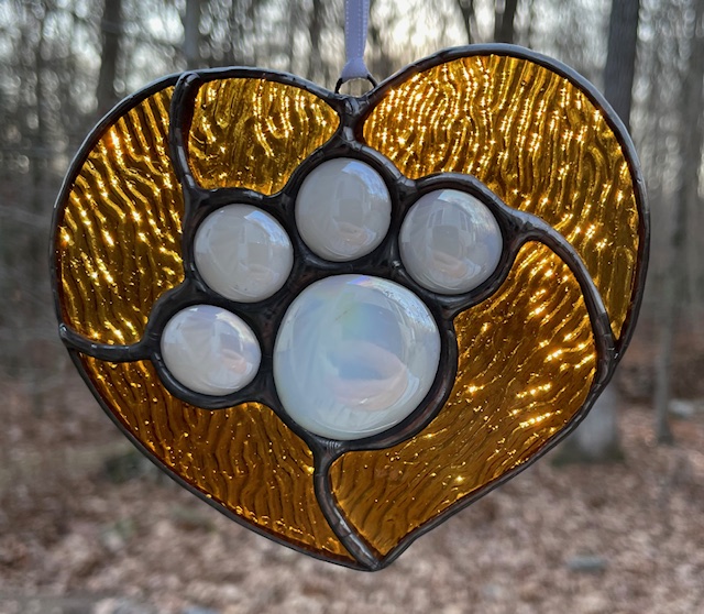 Amber textured stained glass paw print suncatcher